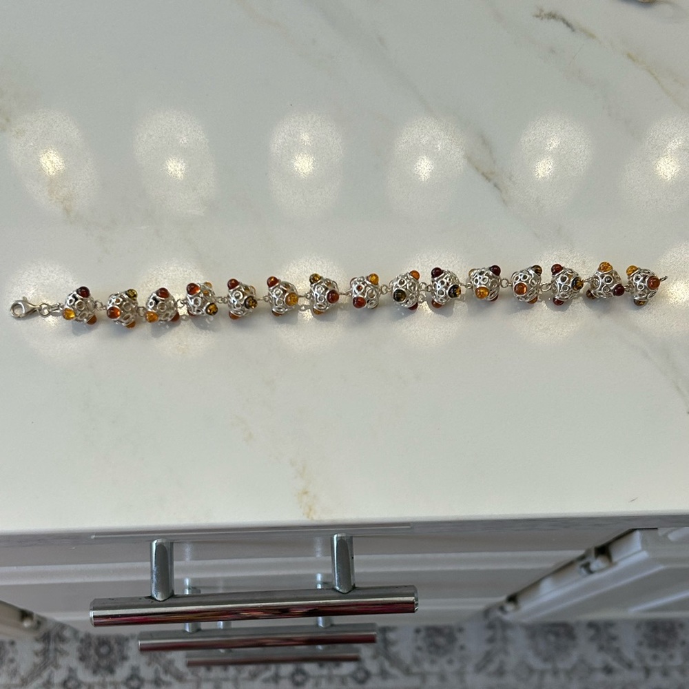 Elegant Sterling Silver and Amber Stone Globe Women's Bracelet